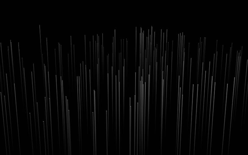 Hawaiian coastline with commercial buildings and palm trees