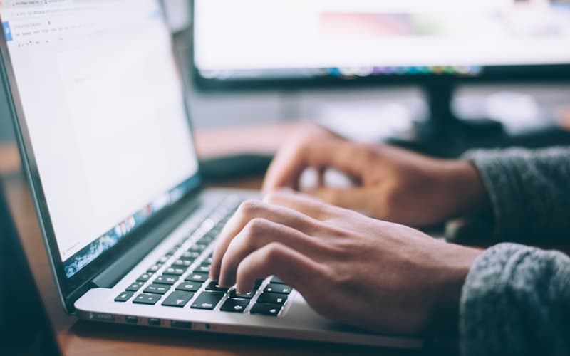 Professional reviewing financial documents in a modern office environment