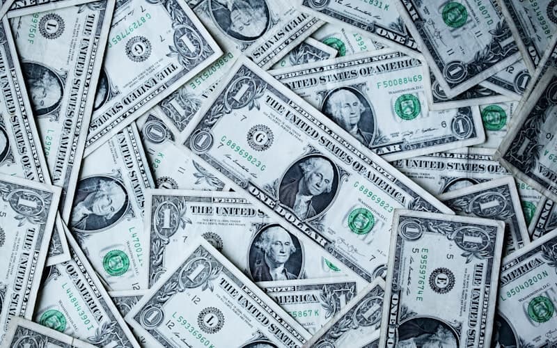 Financial planning documents and laptop on desk